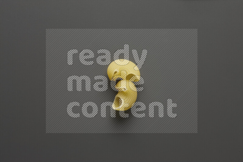 Pipe pasta on grey background