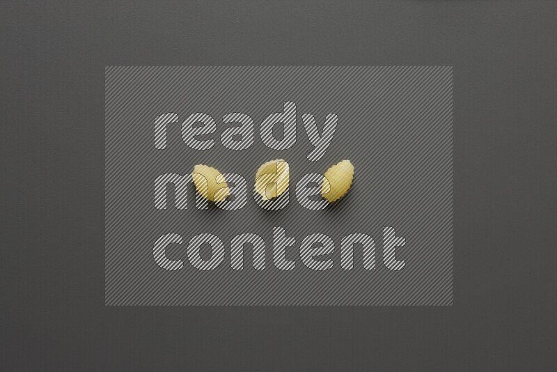 Shells pasta on grey background