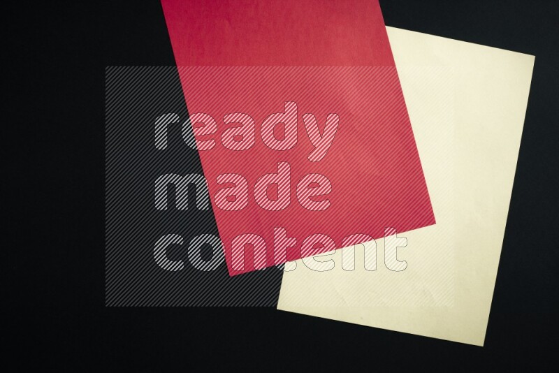 Multicolored paper sheet on black background