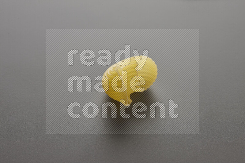 Pipe pasta on grey background