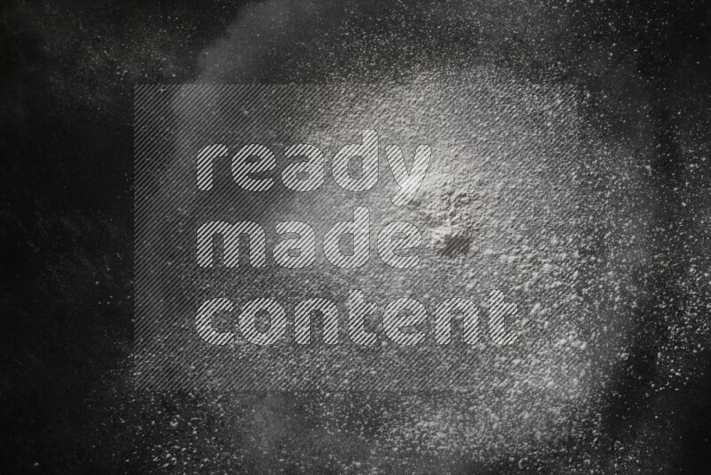 White powder explosion on black background