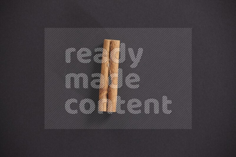 Cinnamon stick on black background