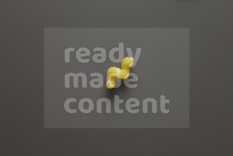Twist pasta on grey background