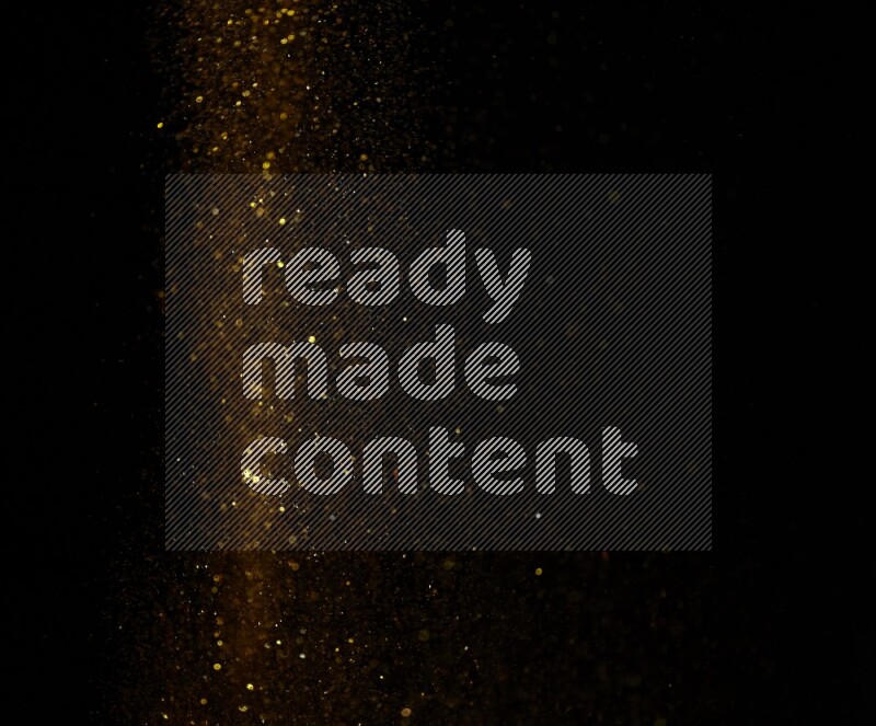 Gold glitter powder isolated on black background