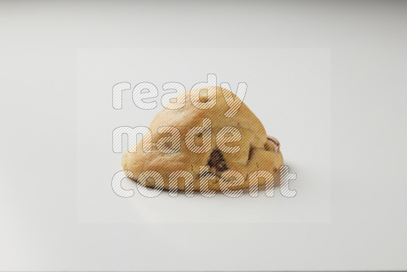 a chocolate chip cookie on a white background