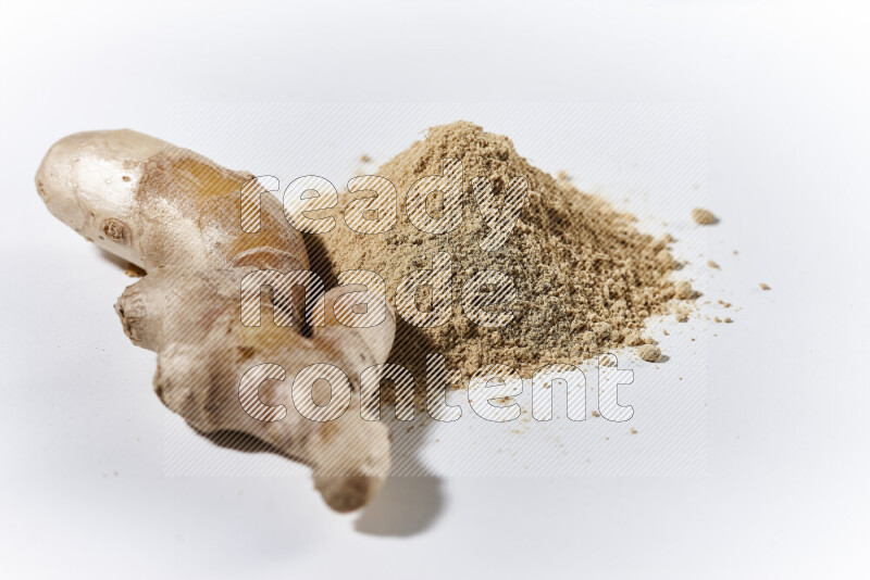 A bunch of ground ginger powder on white background