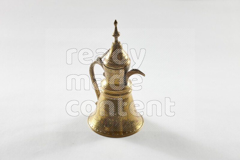 A metal turkish pot for coffee on white background