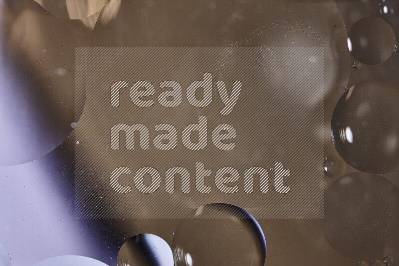 Close-ups of abstract oil bubbles on water surface in shades of white and brown