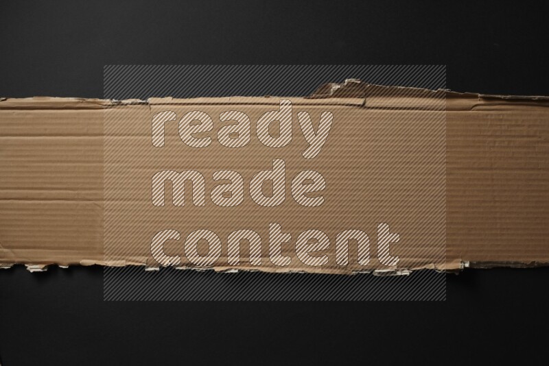 Cardboard on black background