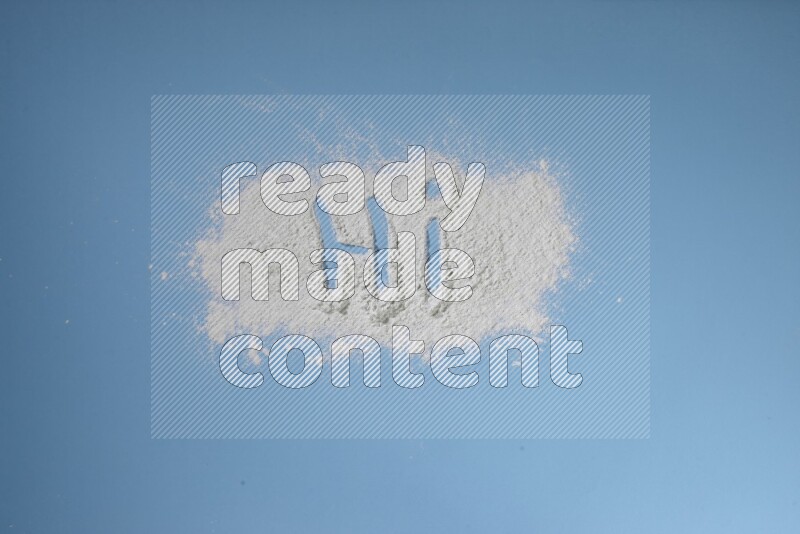 A word written with powder on blue background
