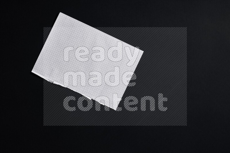 Notebook sheet on black background
