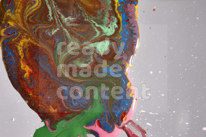 Close-ups of assorted colors blending on a grey background