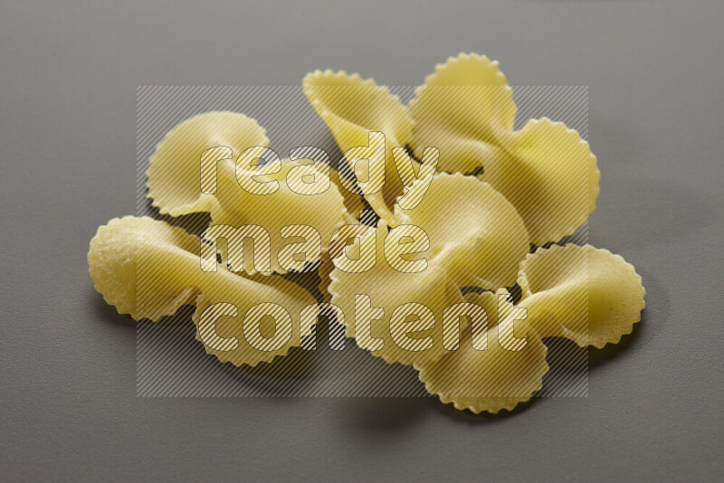 Fiocchi pasta on grey background