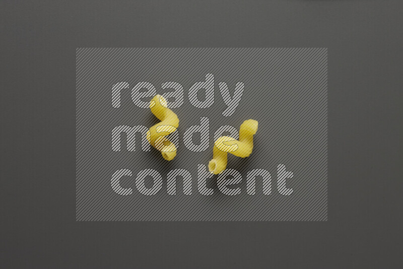 Twist pasta on grey background
