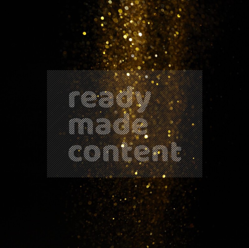 Gold glitter powder isolated on black background