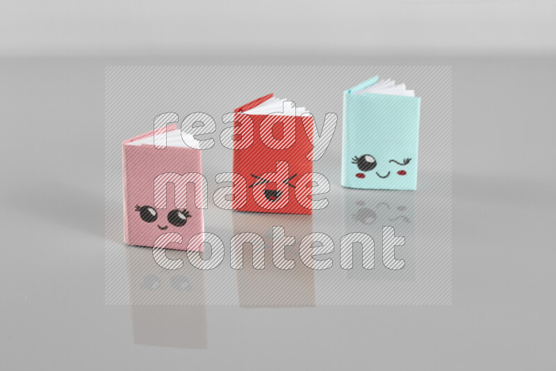Origami book on grey background