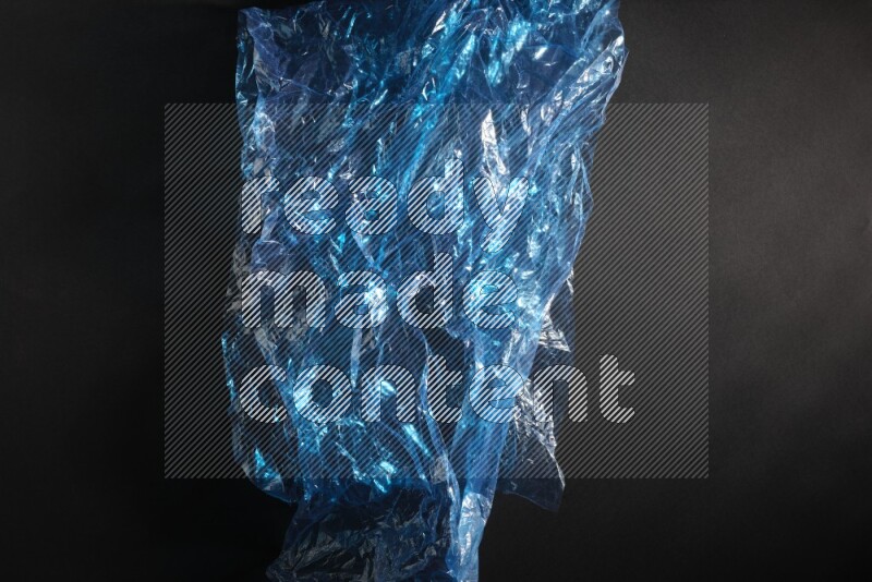 Colored plastic textures on black background