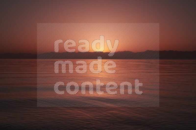 Sunrise over the water