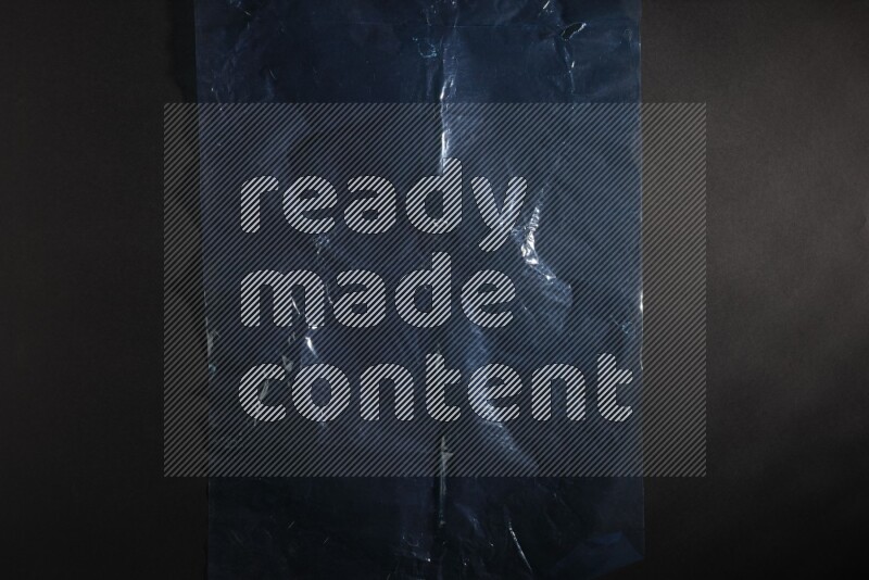 Colored plastic textures on black background