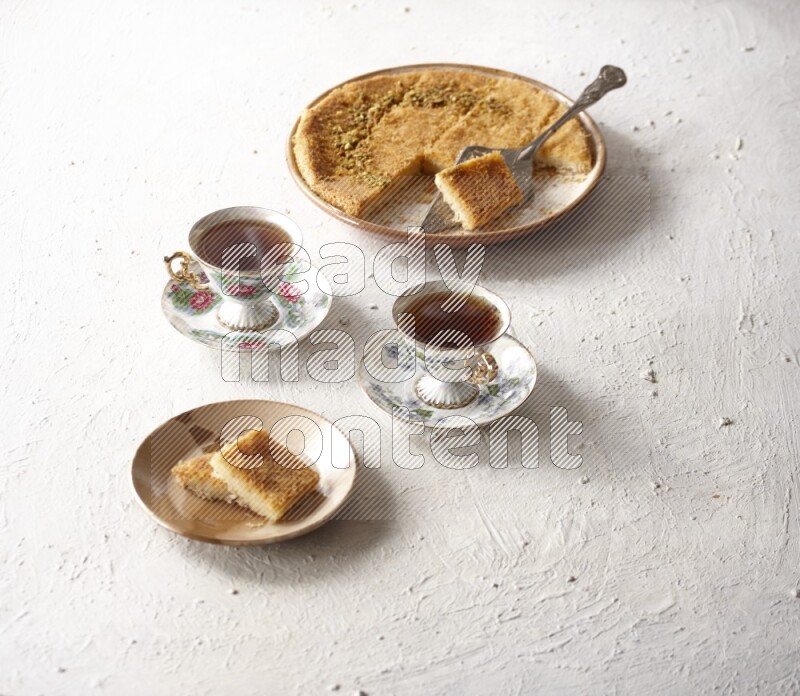 Konafa with tea in a light setup