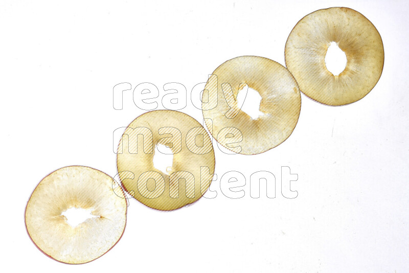 Peach slices on illuminated white background