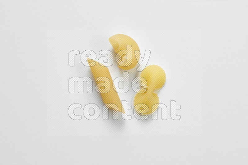 Different pasta types on white background