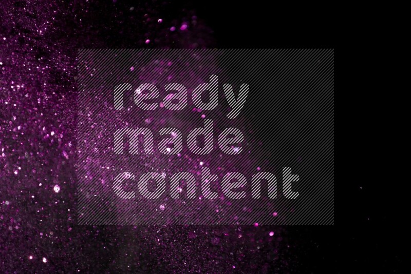 Pink glitter powder isolated on black background