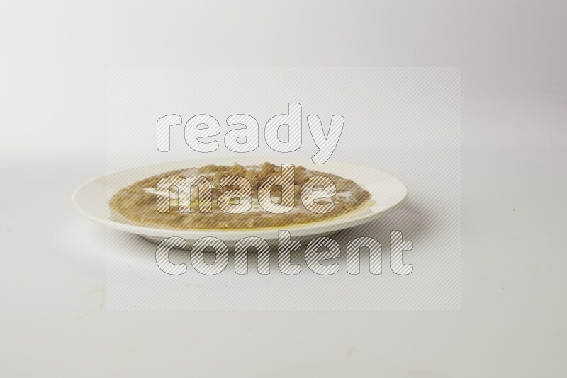 fava bean in a white plate direct on a white background
