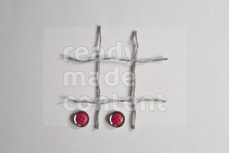 Red buttons placed on grey background