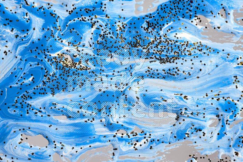 خلفية ملونة مع مزيج من ألوان الطلاء الأزرق والأبيض مع بريق ذهبي متناثر