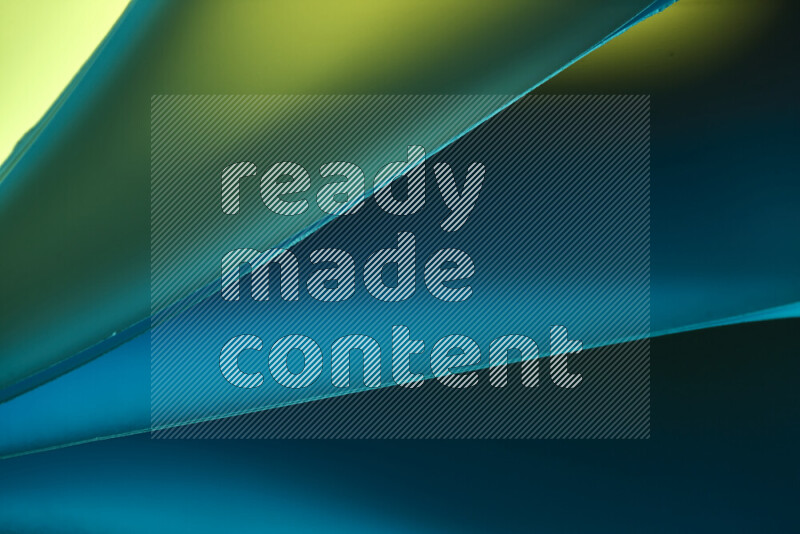 فن تجريدي يعرض منحنيات مع تدرجات الألوان الباردة مكونه بضوء ملون