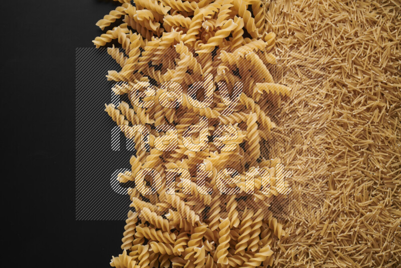 Different pasta types on black background