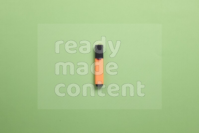 Multicolored highlighter pens on green background