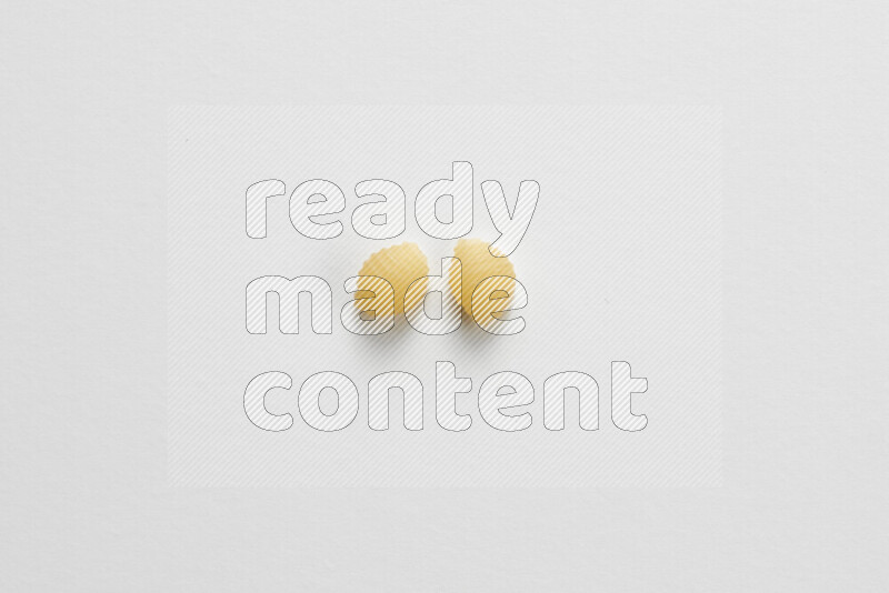 Shells pasta on white background