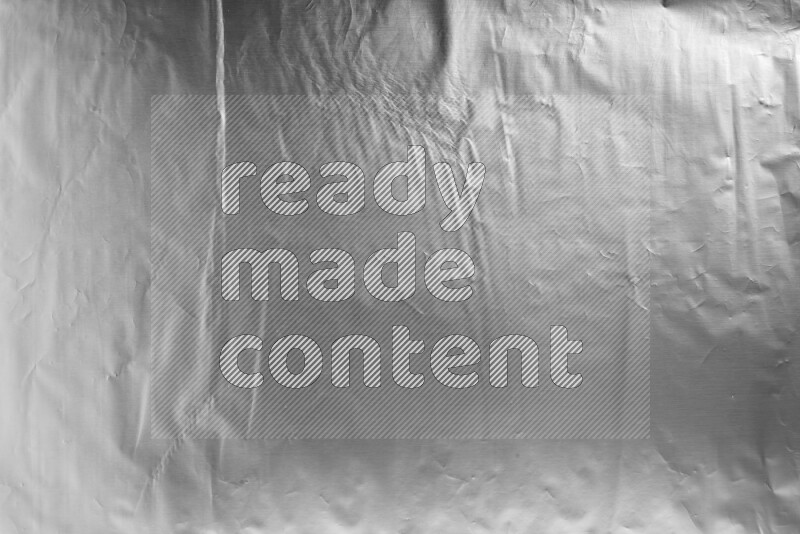 Aluminium foil on black background