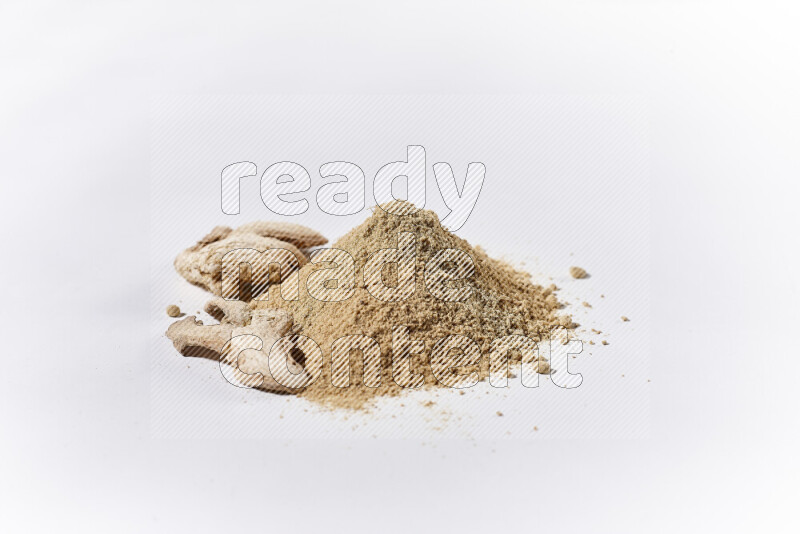A bunch of ground ginger powder on white background