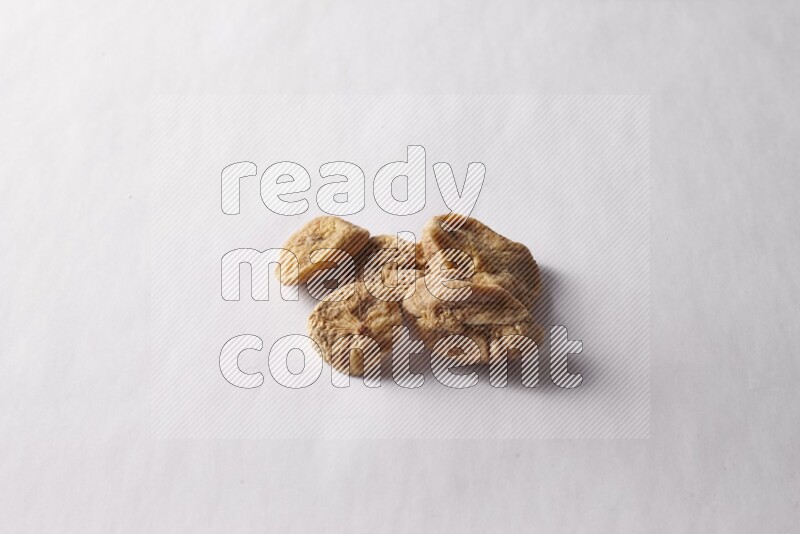 Dried figs on white background