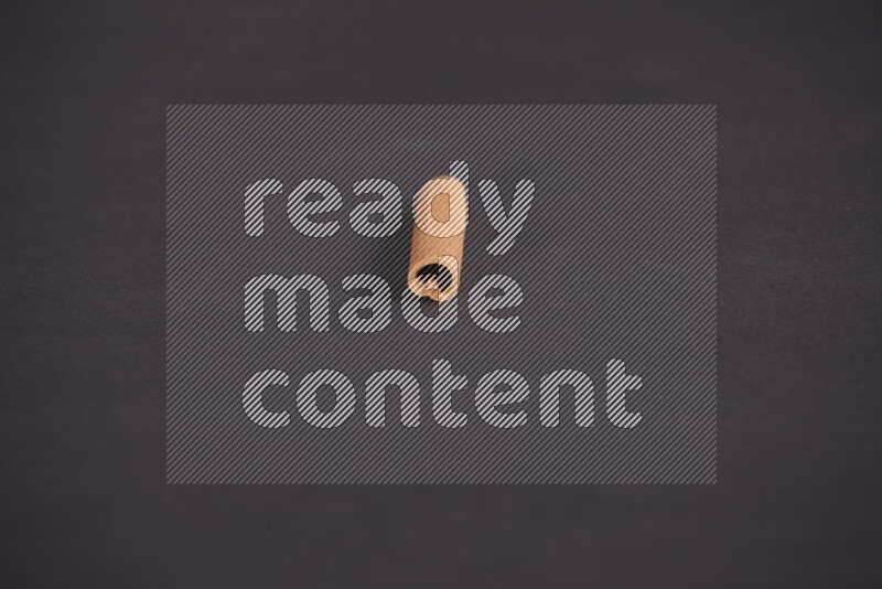 Cinnamon stick on black background