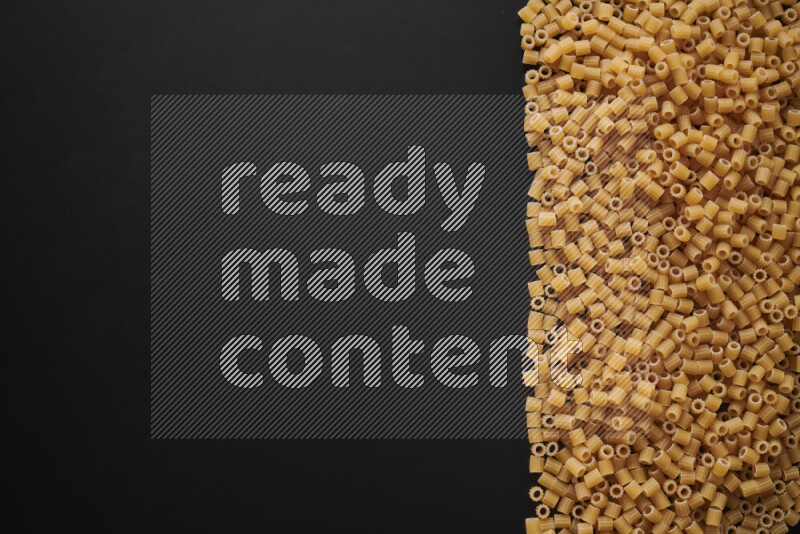 Different pasta types on black background