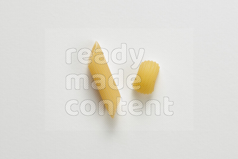 Different pasta types on white background