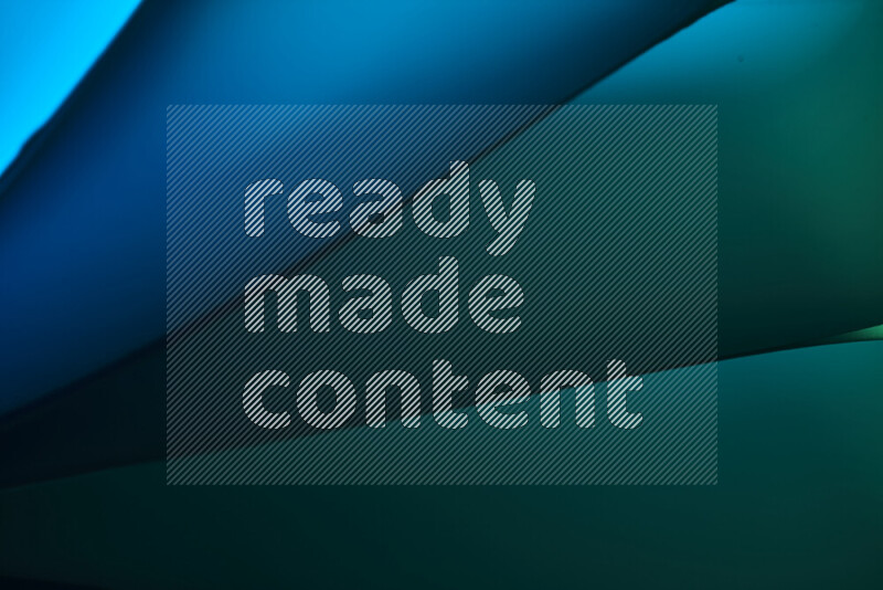 فن تجريدي يعرض منحنيات مع تدرجات الألوان الباردة مكونه بضوء ملون