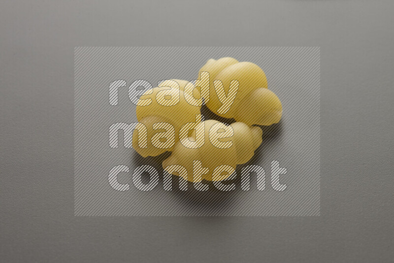 Snails pasta on grey background