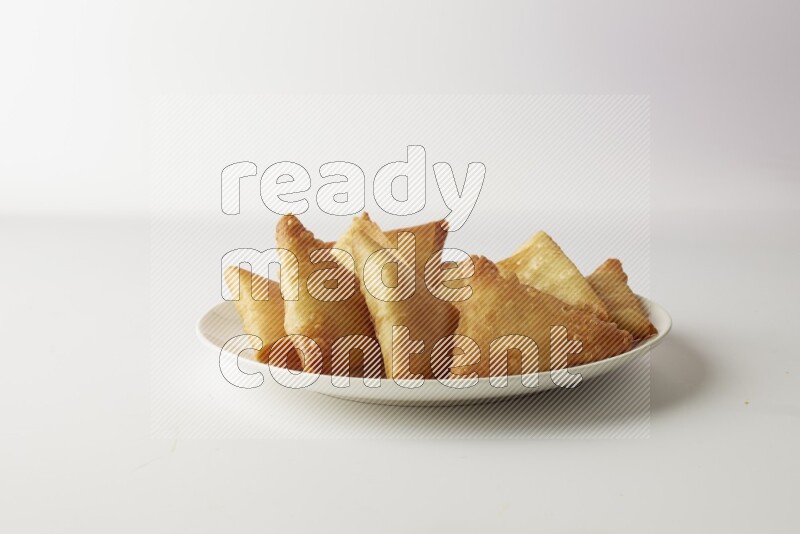 sambosas on a white background