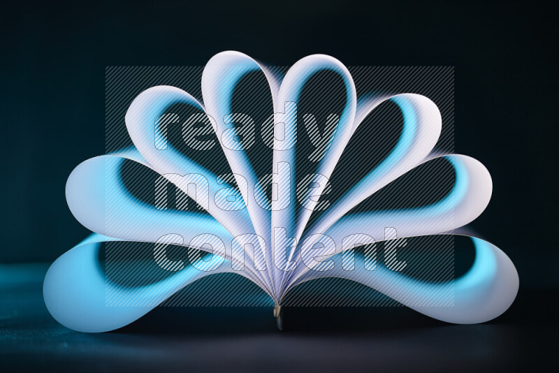 An abstract art piece displaying smooth curves in blue and white gradients created by colored light