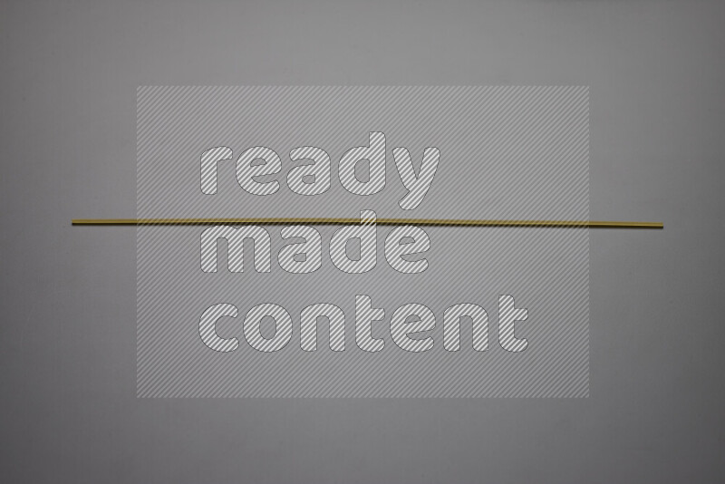 Spaghetti pasta on grey background