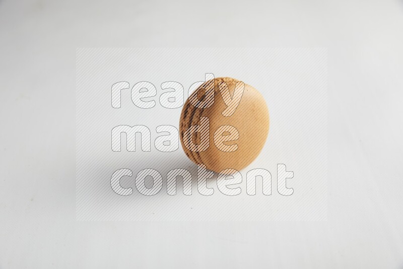 45º Shot of Brown Maple Taffy macaron on white background