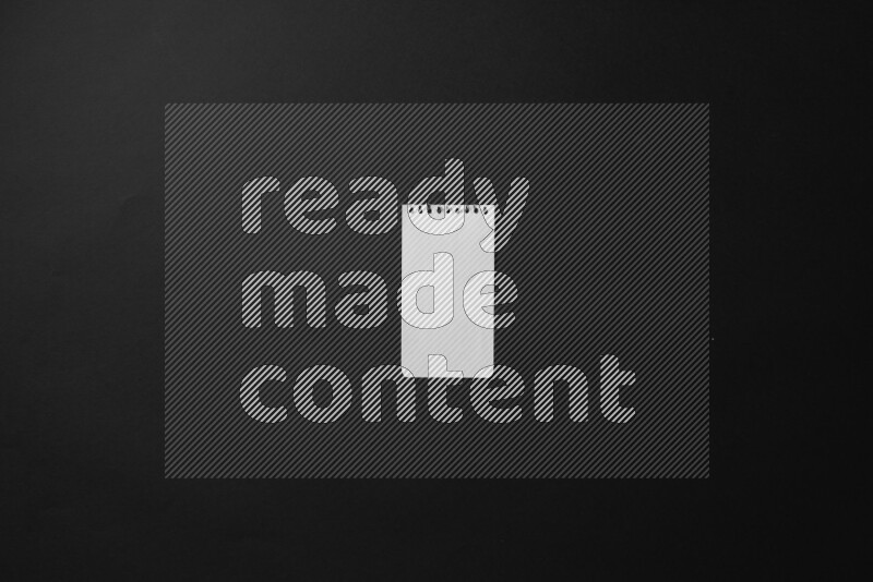 Notebook sheet on black background