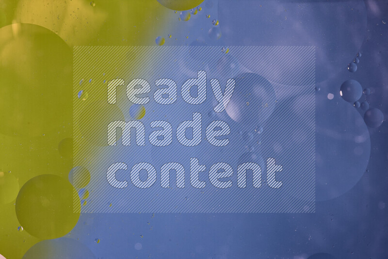 Close-ups of abstract oil bubbles on water surface in shades of blue and green