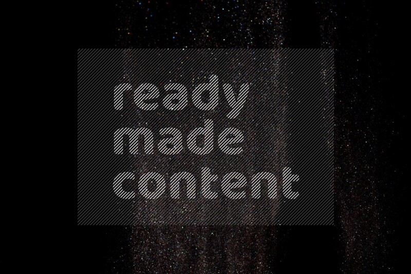Multicolored glitter powder isolated on black background
