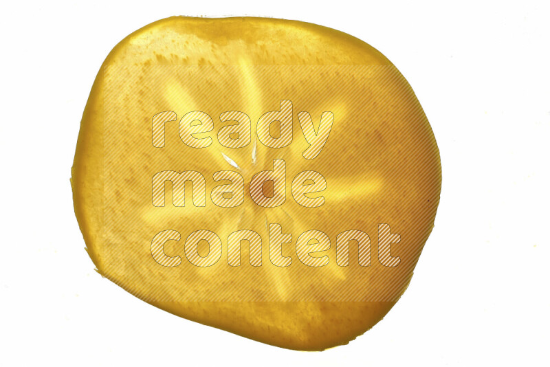 شرائح من فاكهة الكاكا علي خلفية بيضاء مضيئة